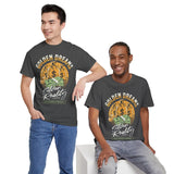 Golden Dreams Silver Reality Money Graphic Unisex Heavy Cotton Tee Bold Hustler Cash Bag Dollar Streetwear Motivational T Shirt