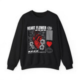 Heart Flower Graphic Unisex Heavy Blend Crewneck Sweatshirt Comfortable Streetwear Pullover Bold Red and Black Floral Heart Design Symbol of Love Strength and Vitality Perfect Gift for Friends...