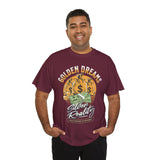 Golden Dreams Silver Reality Money Graphic Unisex Heavy Cotton Tee Bold Hustler Cash Bag Dollar Streetwear Motivational T Shirt