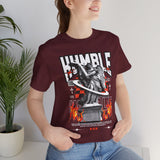 Humble Angel Statue Graphic Unisex Jersey Short Sleeve Tee Streetwear Fire Print T Shirt Bold Motivational Urban Fashion Outfit
