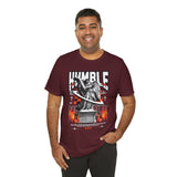 Humble Angel Statue Graphic Unisex Jersey Short Sleeve Tee Streetwear Fire Print T Shirt Bold Motivational Urban Fashion Outfit