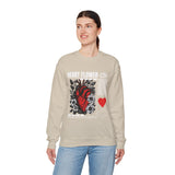 Heart Flower Graphic Unisex Heavy Blend Crewneck Sweatshirt Comfortable Streetwear Pullover Bold Red and Black Floral Heart Design Symbol of Love Strength and Vitality Perfect Gift for Friends Birthdays Cozy Days and Everyday Wear
